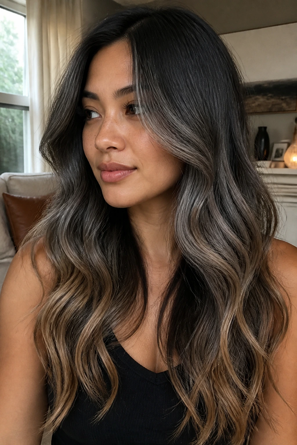 Long layered waves with ash grey balayage and caramel ends