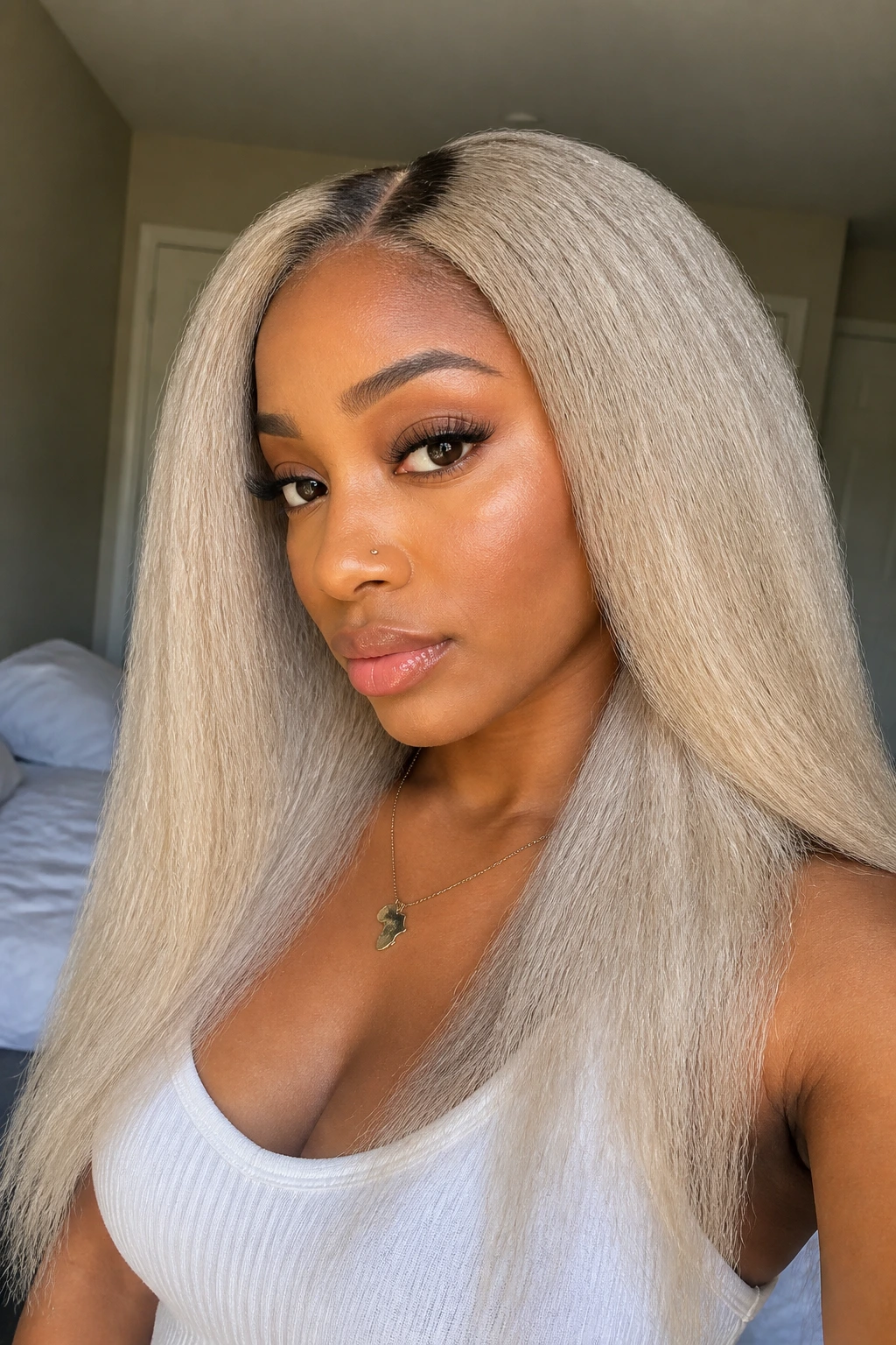 Real woman with ash platinum kinky straight U-part wig