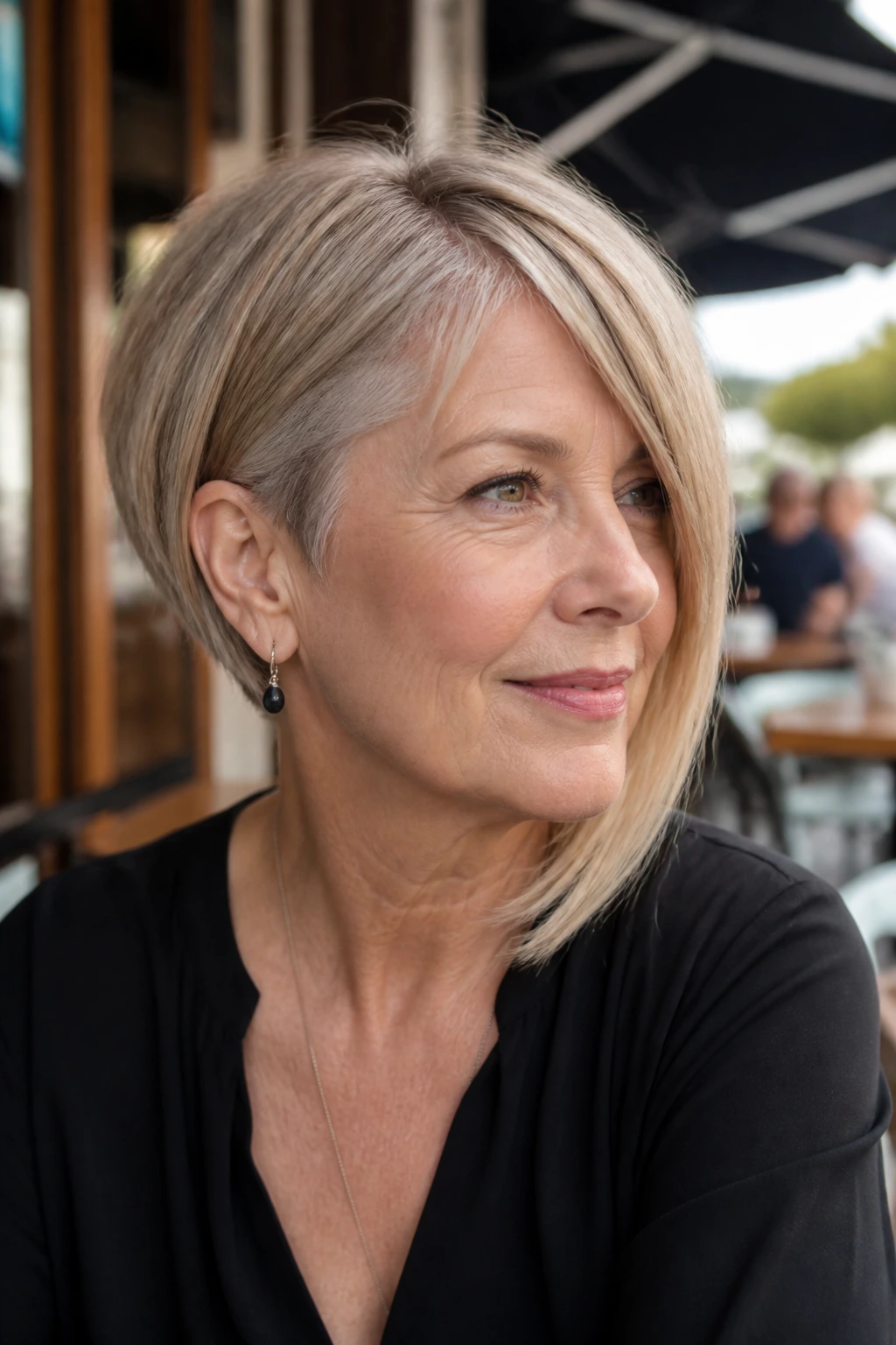 Close-up of a woman wearing an asymmetrical bob hairstyle