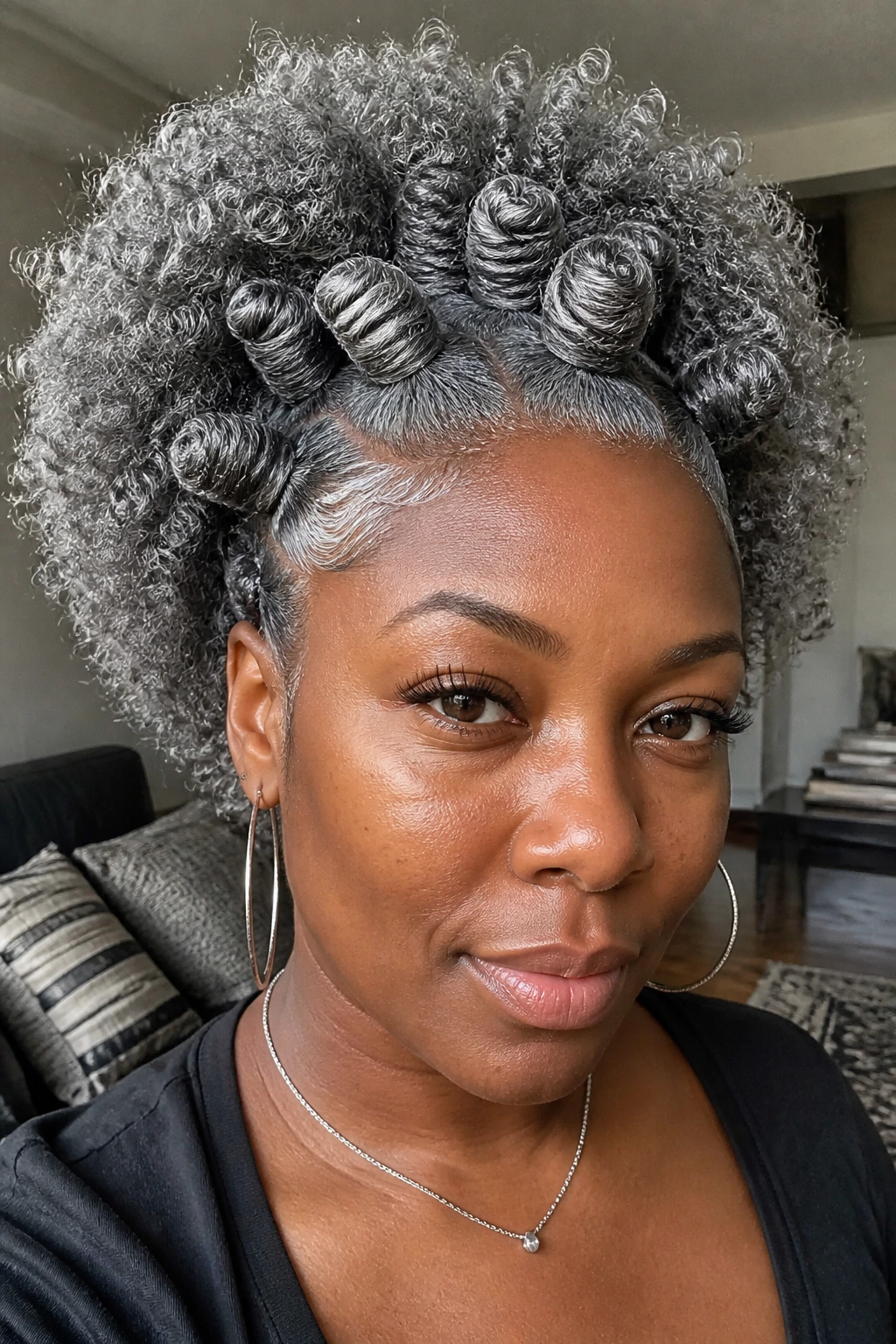 Close-up portrait of Bantu Knot Set with a Silver Halo on a real person, knots visible.