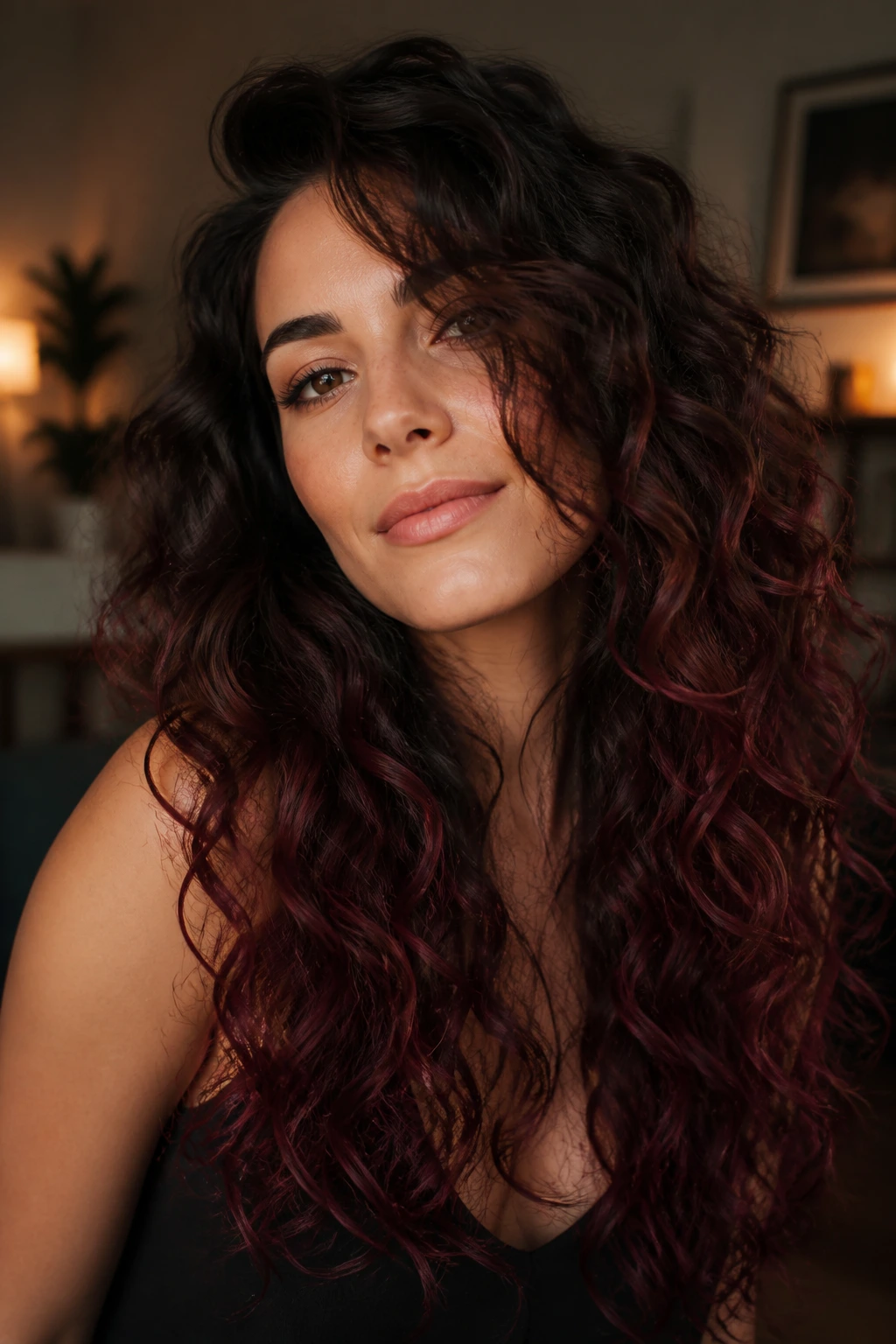 Curly hair with berry brunette ombre ends