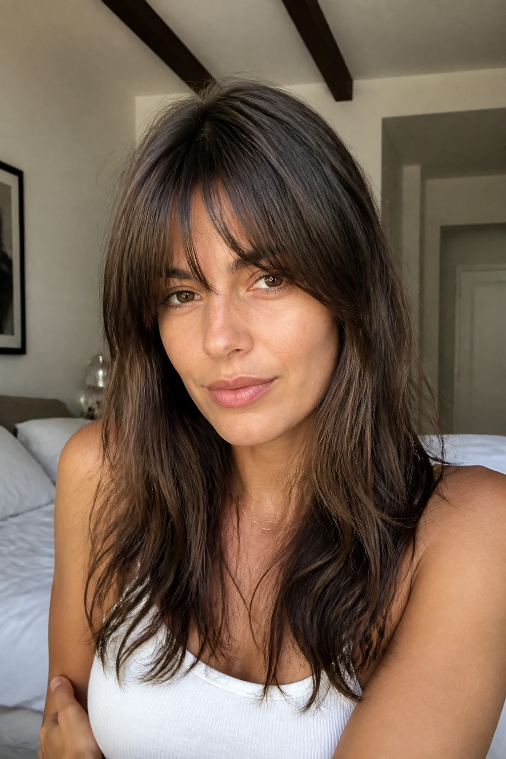 Close-up portrait of a real woman with Birkin-style fringe updated look