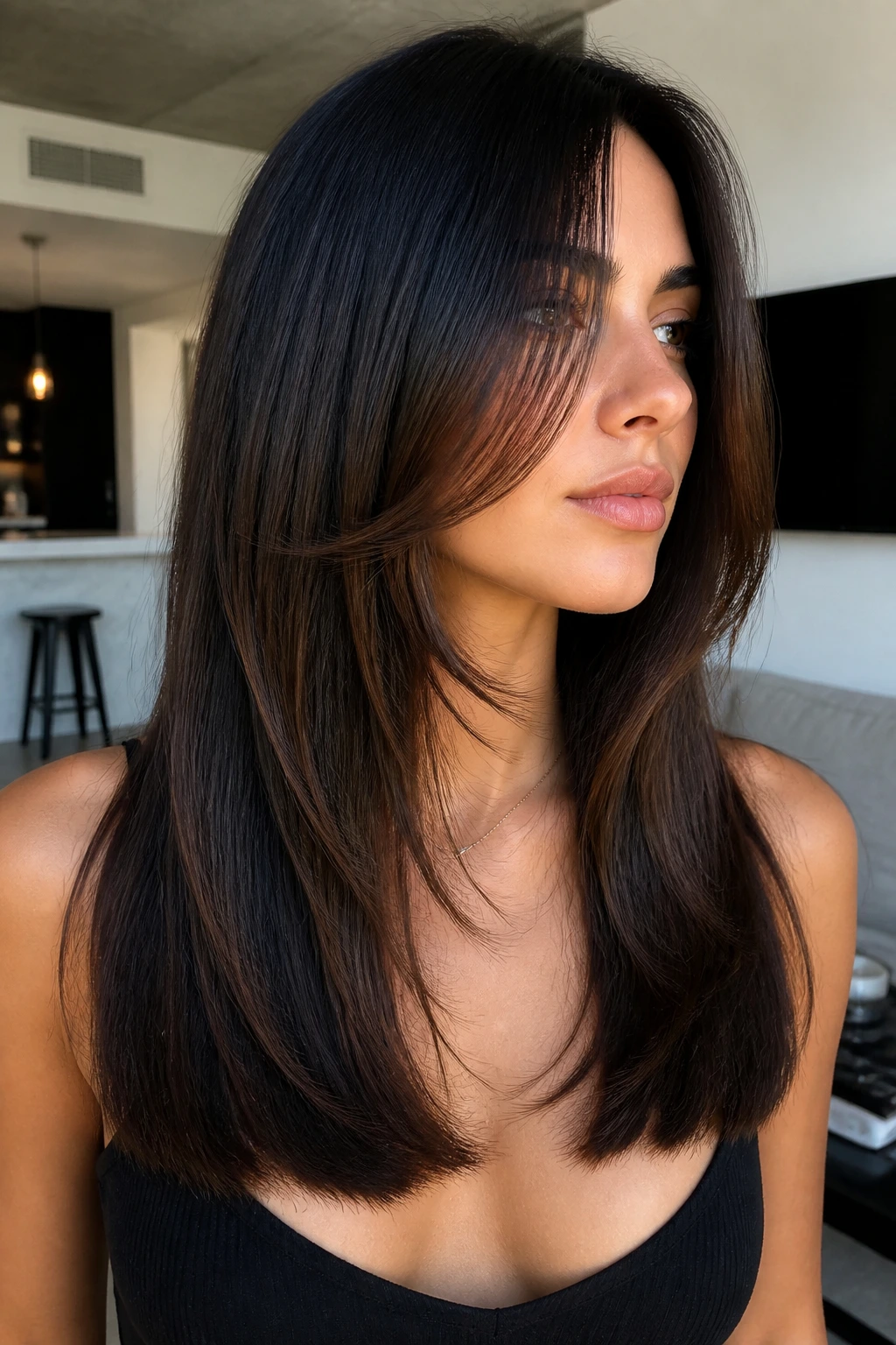 Close-up of a real person with blunt ends and floating face-framing front pieces