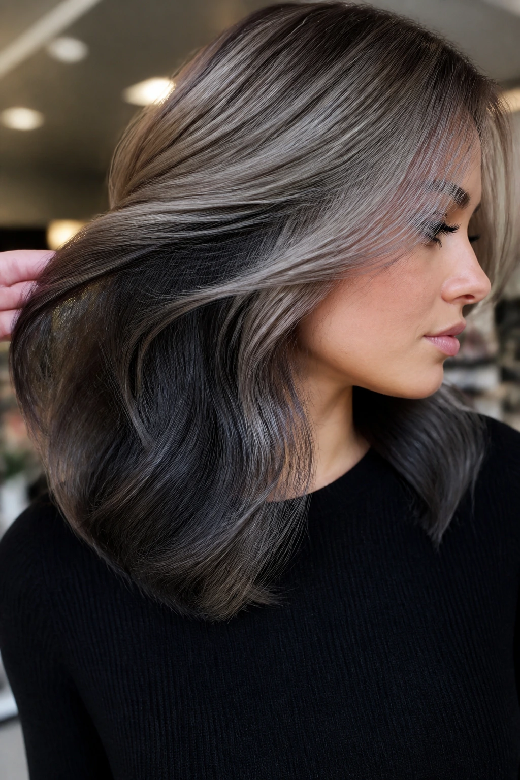 Close-up portrait with carbon ash underlights visible as hair moves