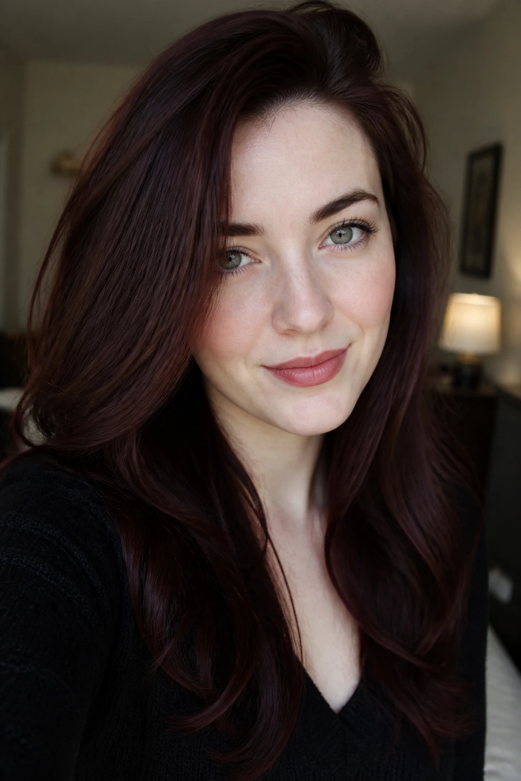 Portrait of person with chocolate cherry hair and pale skin in daylight