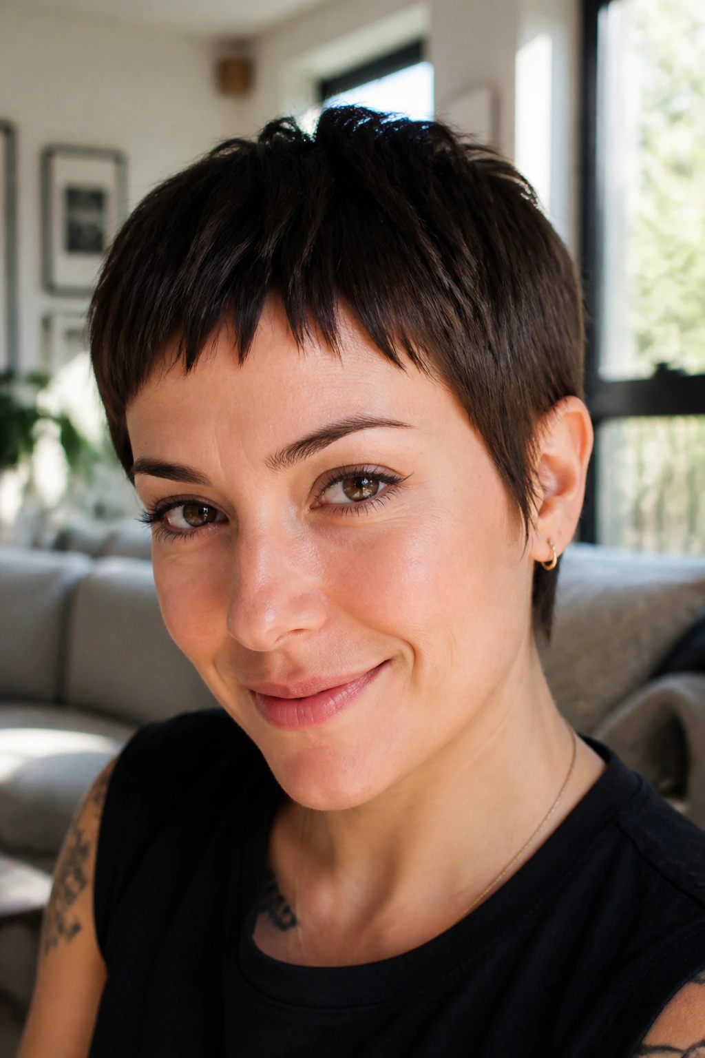 Choppy baby bangs with tapered sides on a short hairstyle