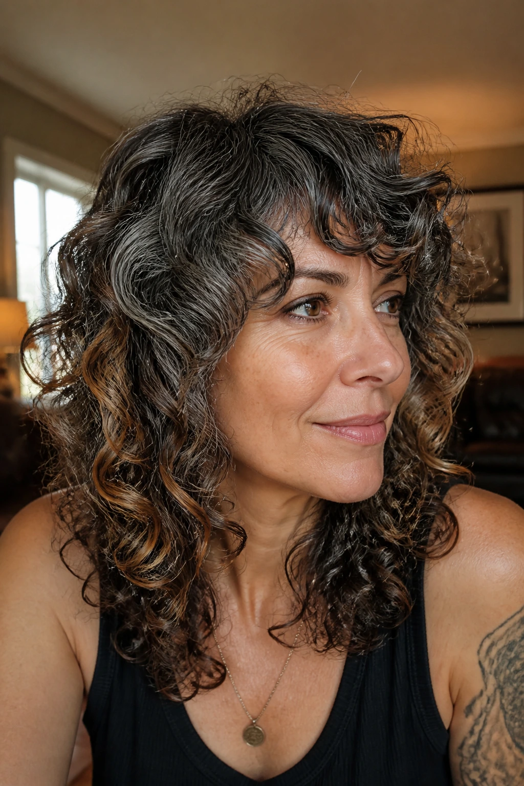 Curly shag with caramel peekaboo panels on a real person