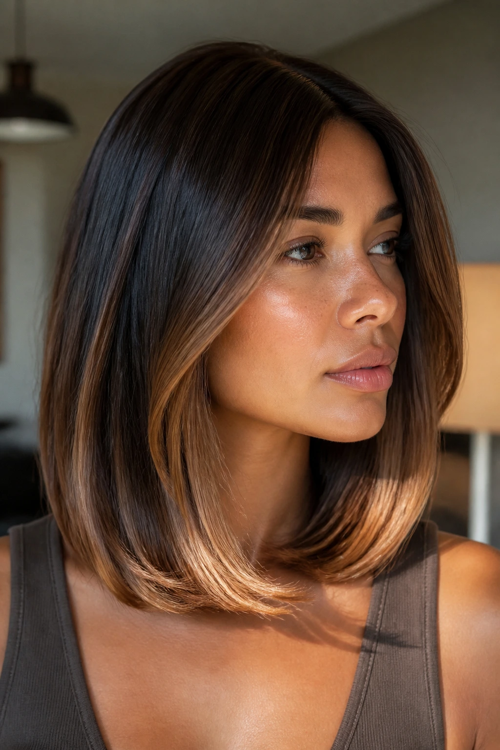 Portrait of a real woman with dark caramel lob and glossy ends