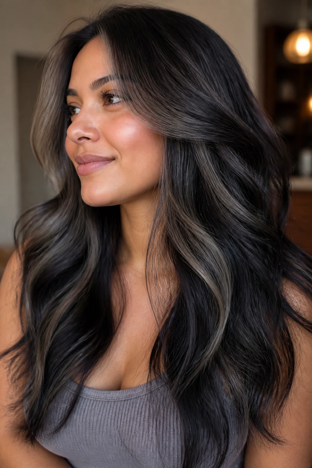 Close-up of thick hair with deep smoke panels on a real person in natural light