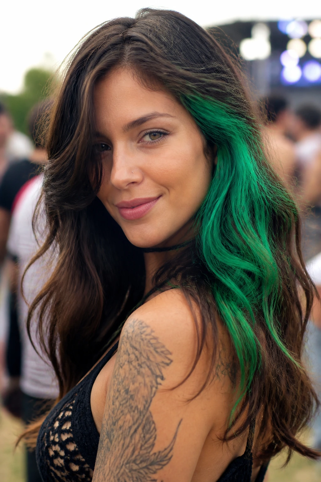 Long layered hair with an emerald side panel on one side.
