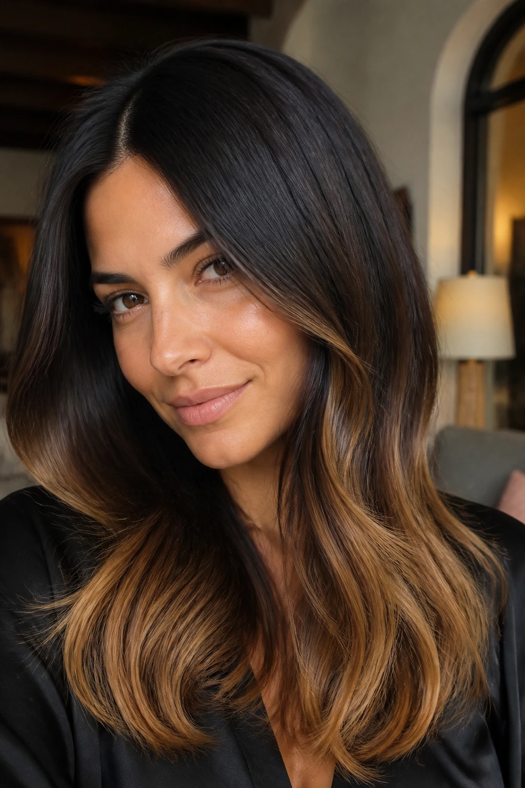 Portrait of a woman with espresso base and toffee ends hair color