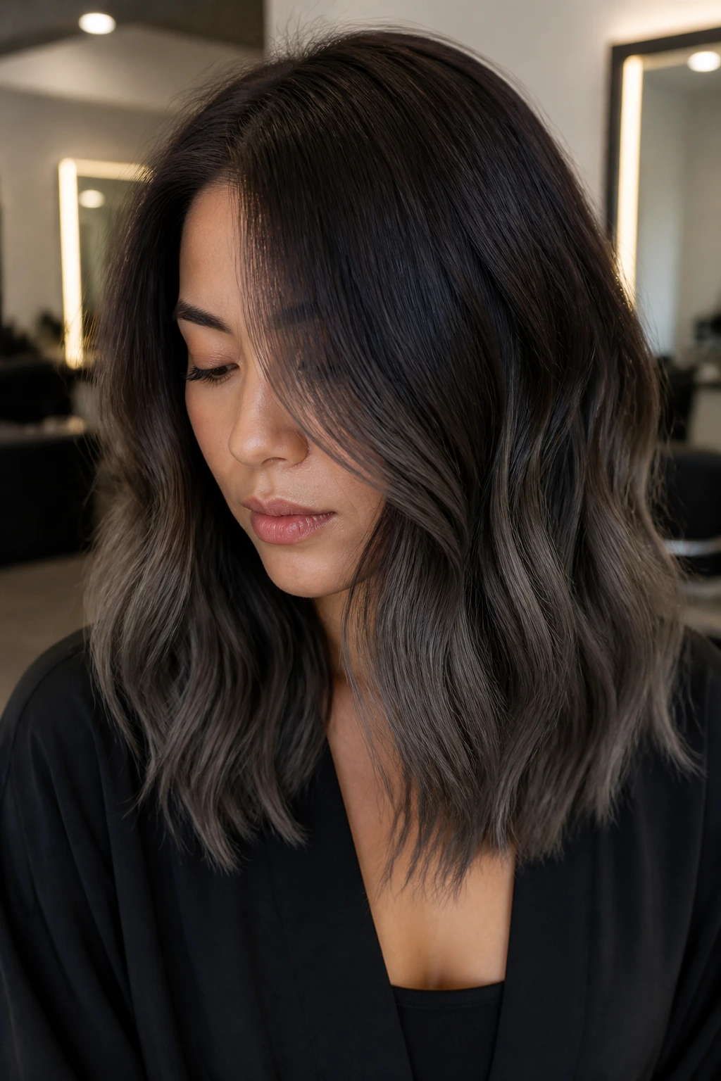 Medium-length hair with espresso-to-smoky gradient and soft waves