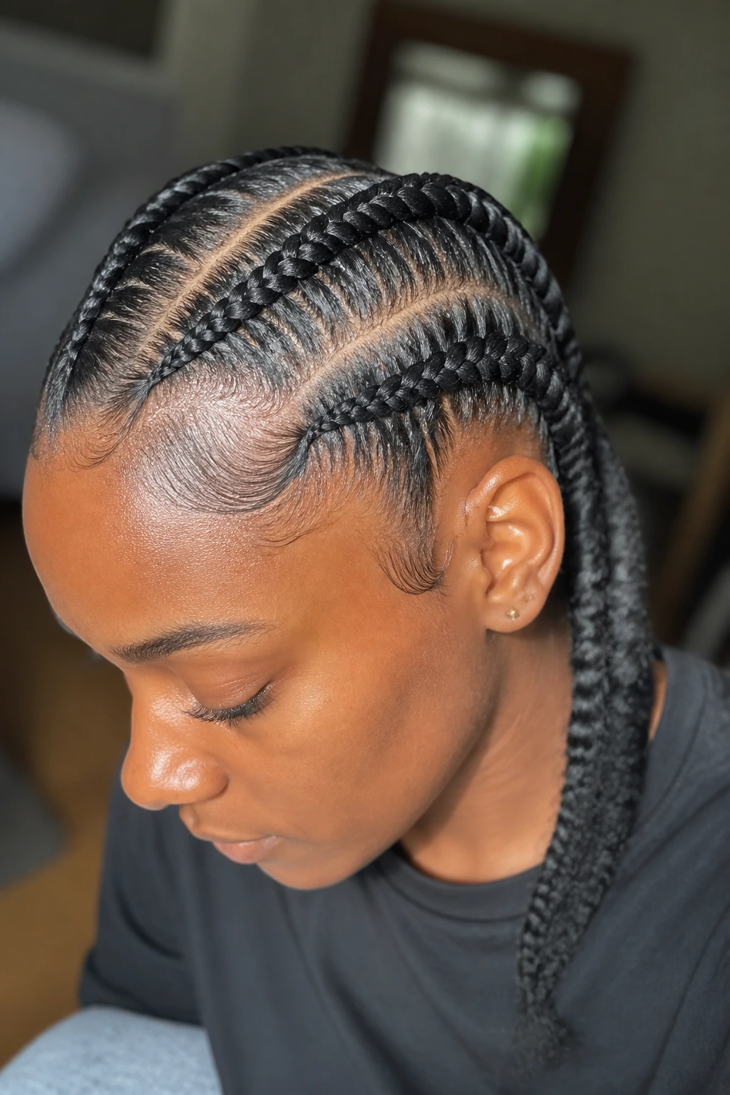 Close-up of a real woman with feed-in double Dutch braids