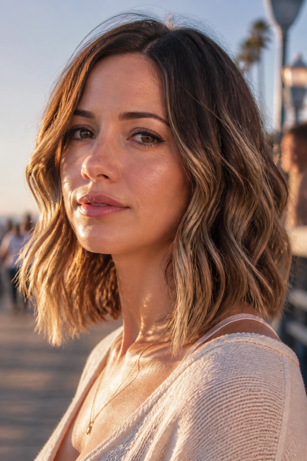Close-up portrait of a person with flat-iron wave lob and gentle kinks