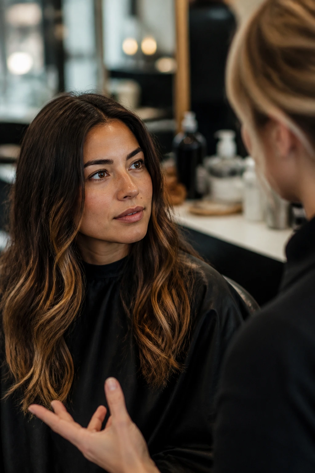 Client in salon consult before foil application
