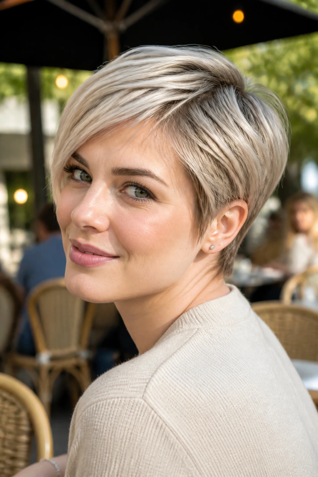 Real person with frost beige pixie-bob showing height on top and soft sides.