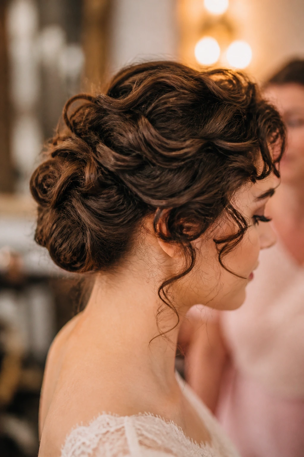 Close-up of a real woman's neck and hair showing a Gibson roll at the nape