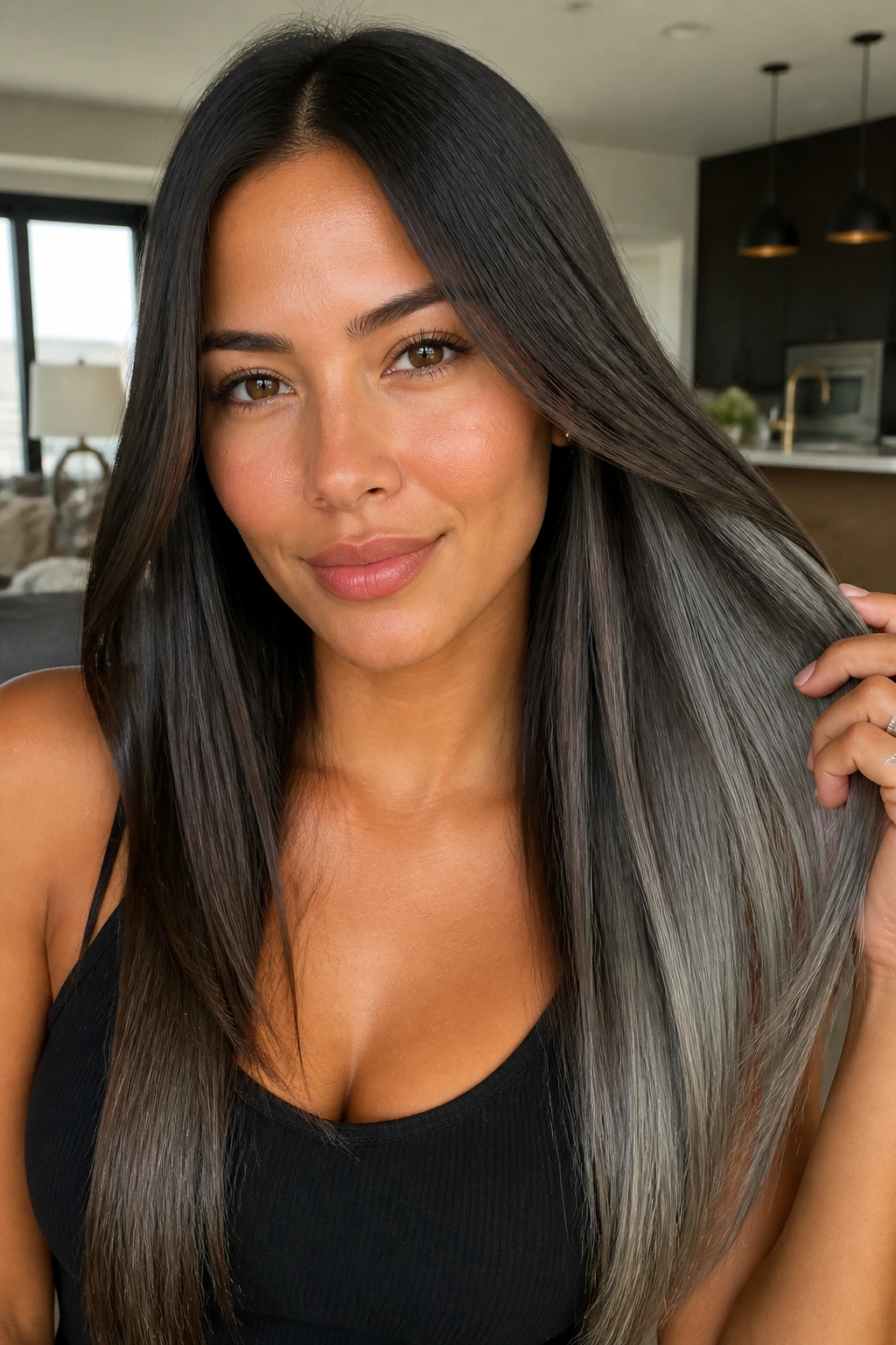 Close-up of a real person with glossy straight hair and steely underlights on tan skin