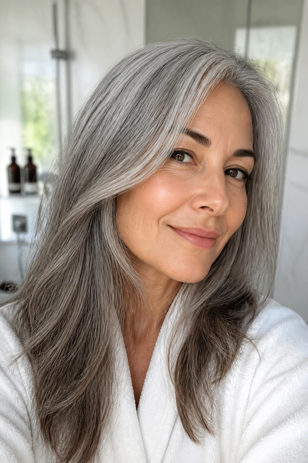 Close-up of a grey-haired woman with bright, well-maintained colour between appointments