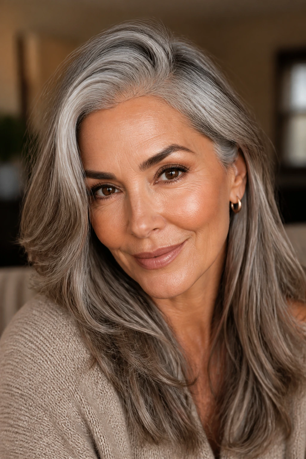 Portrait of person with grey hair and warm undertones in soft light