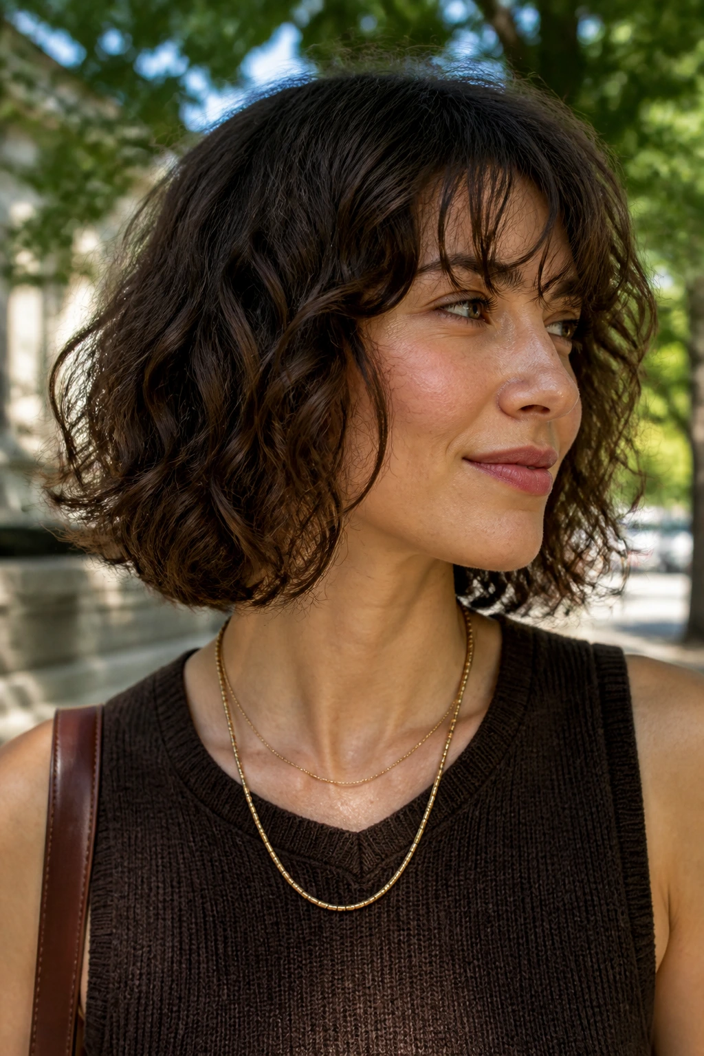 Portrait of a real woman with a grow-out bob looking intentional
