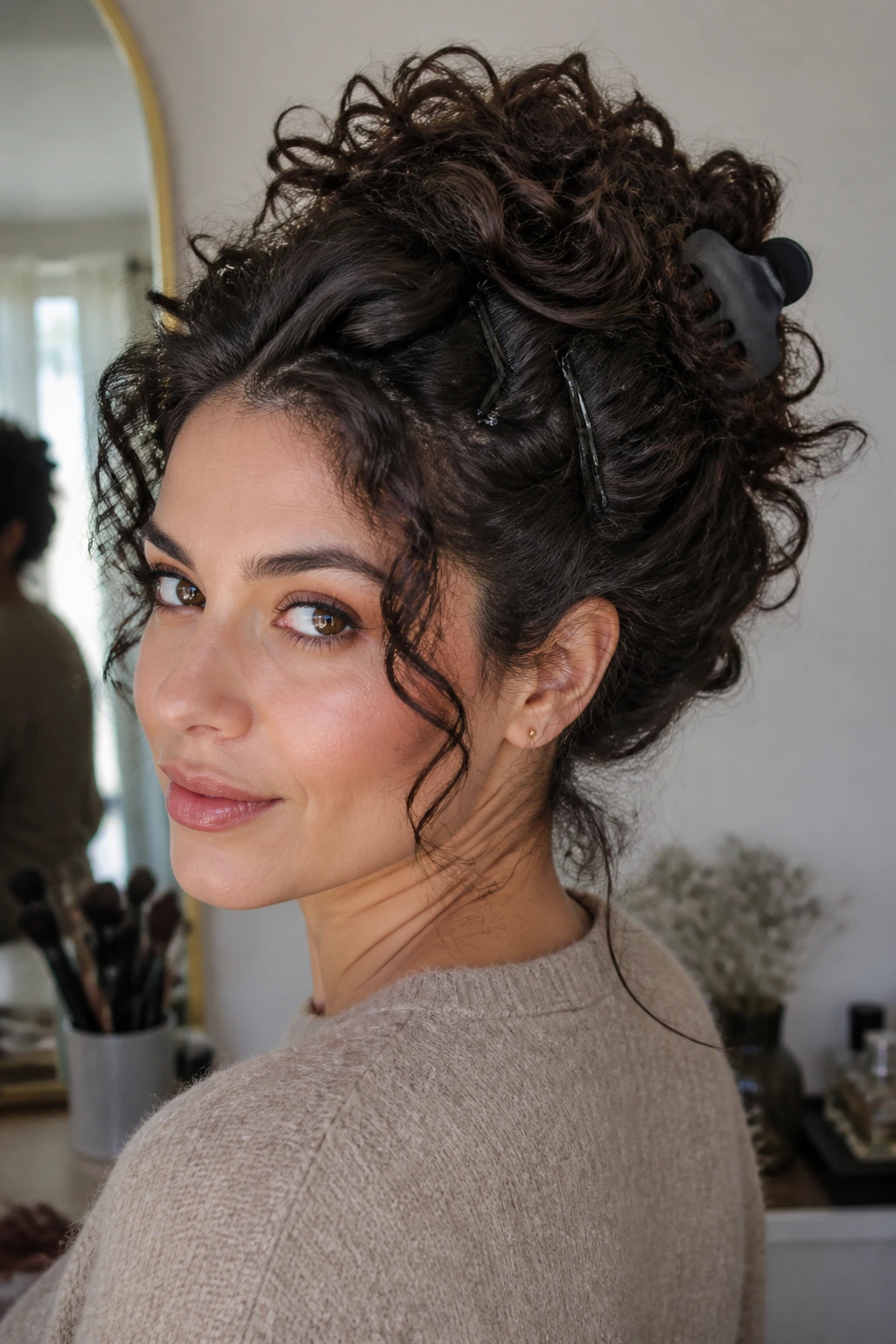 Real person with updo secured by matte pins and claw clip