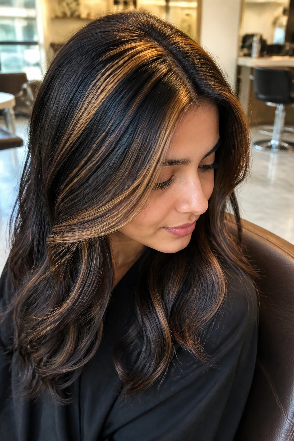 Close-up of a real person showing golden halo highlights around the crown