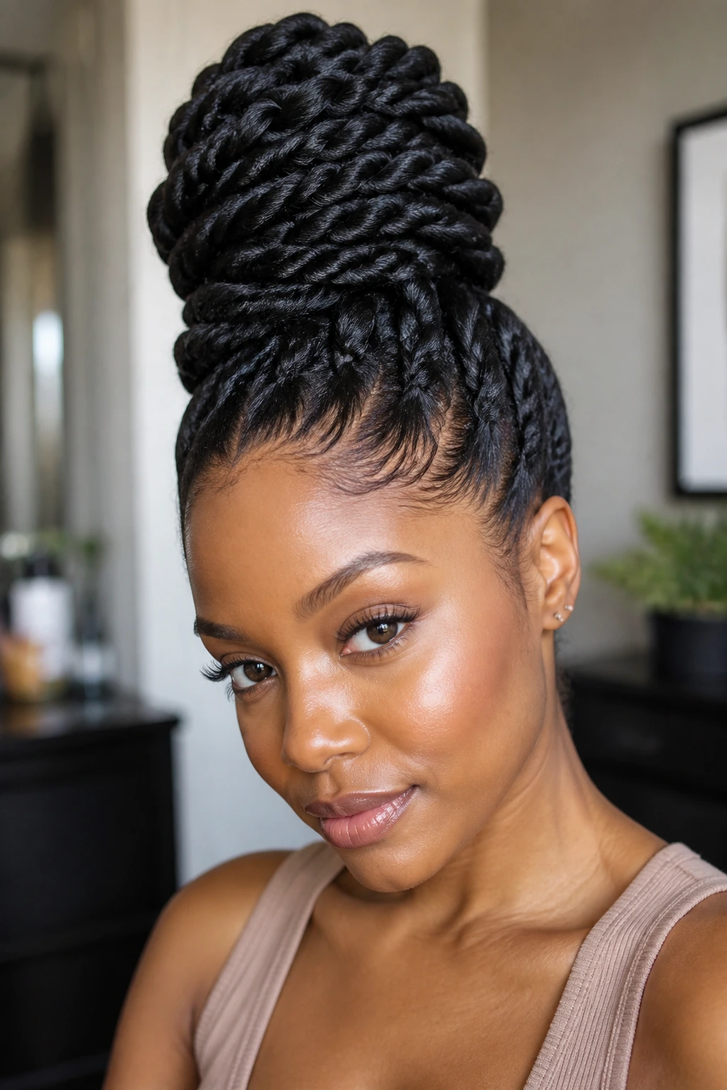 Real woman with high coil twist topknot