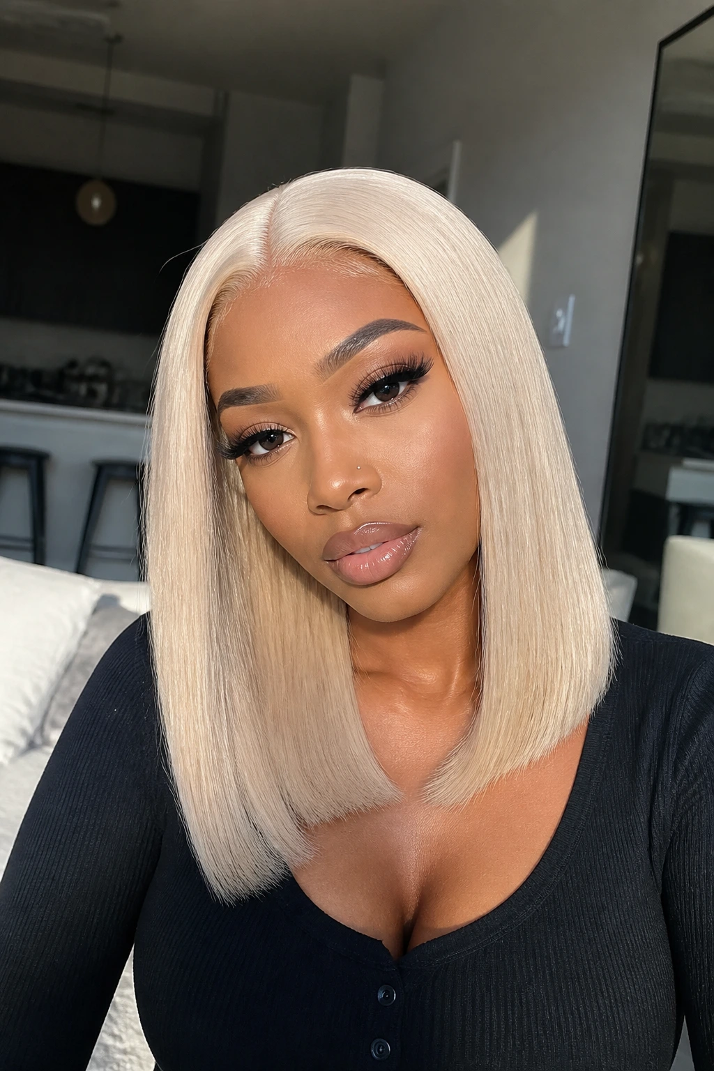 Real woman wearing ice blonde silky straight HD lace wig with natural hairline.