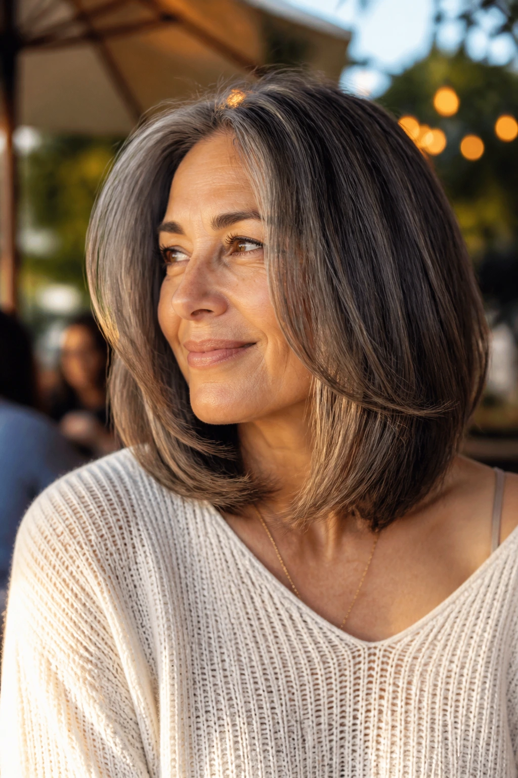 Close-up of invisible-layer lob on real woman outdoors