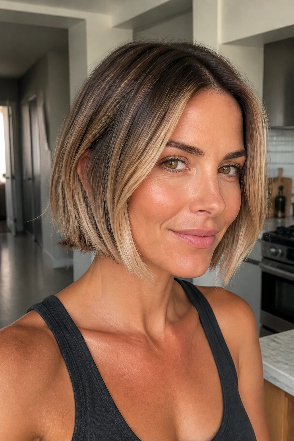 Close-up of a real woman with Italian bob and rooted beige ends