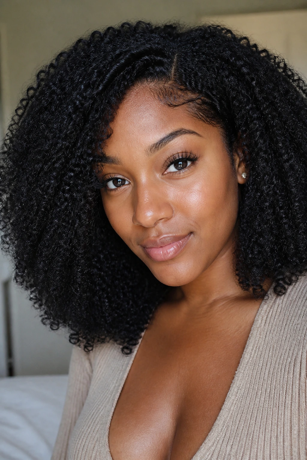 Close-up of a real woman wearing kinky-curly wig