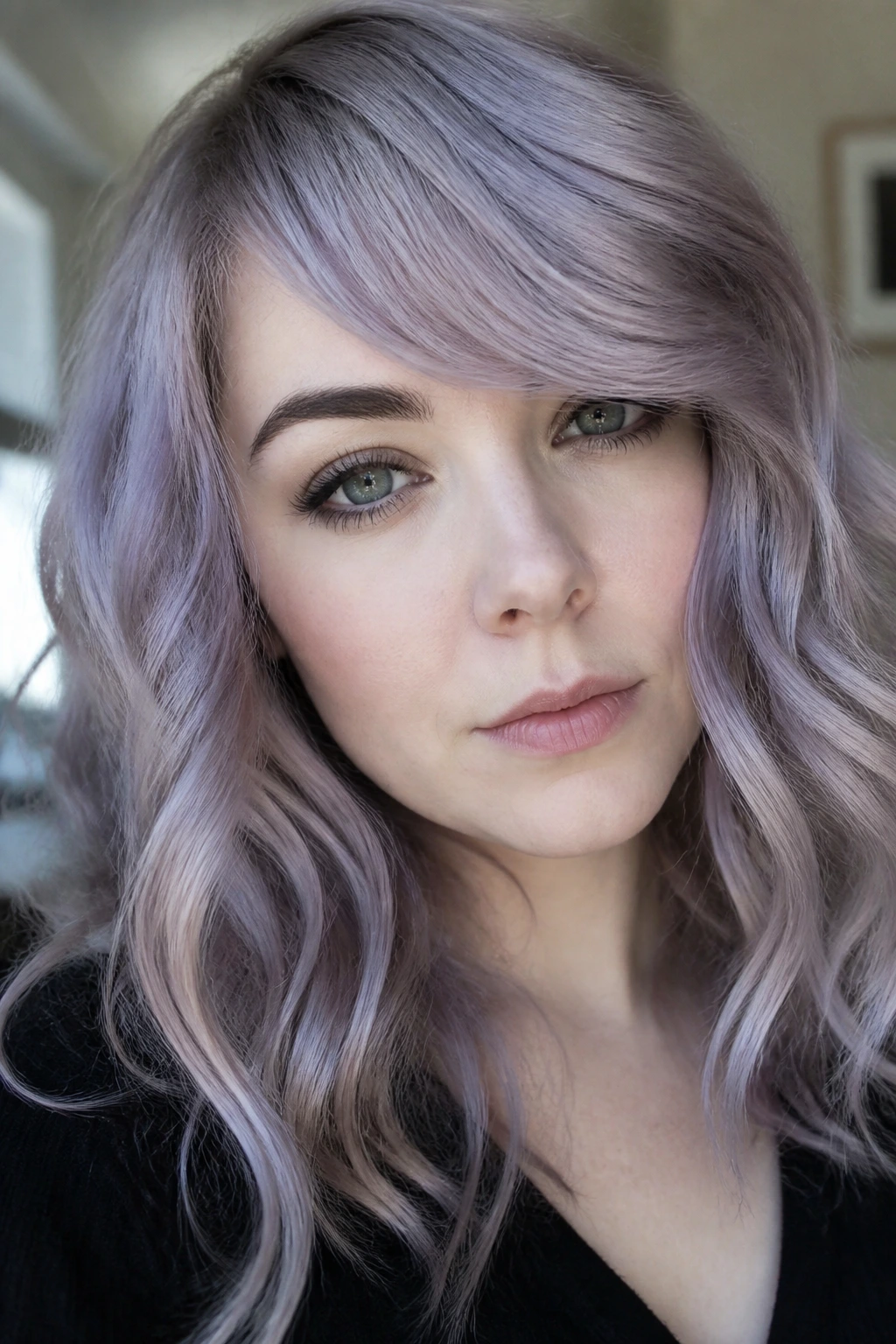 Close-up of lavender-grey waves with side-swept fringe on a pale-skinned real person.