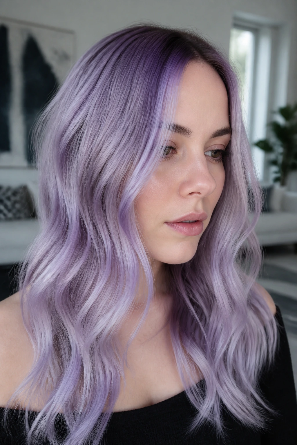 Close-up of a real person with pale lavender hair gradient under cool light