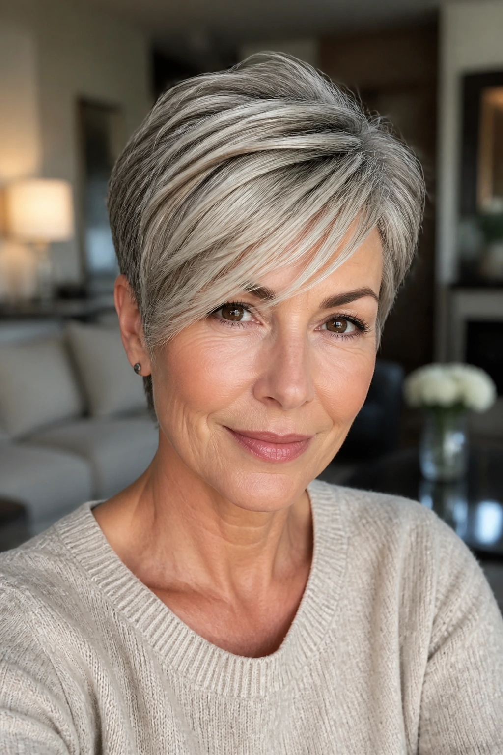 Real woman with long pixie and swept fringe in soft light