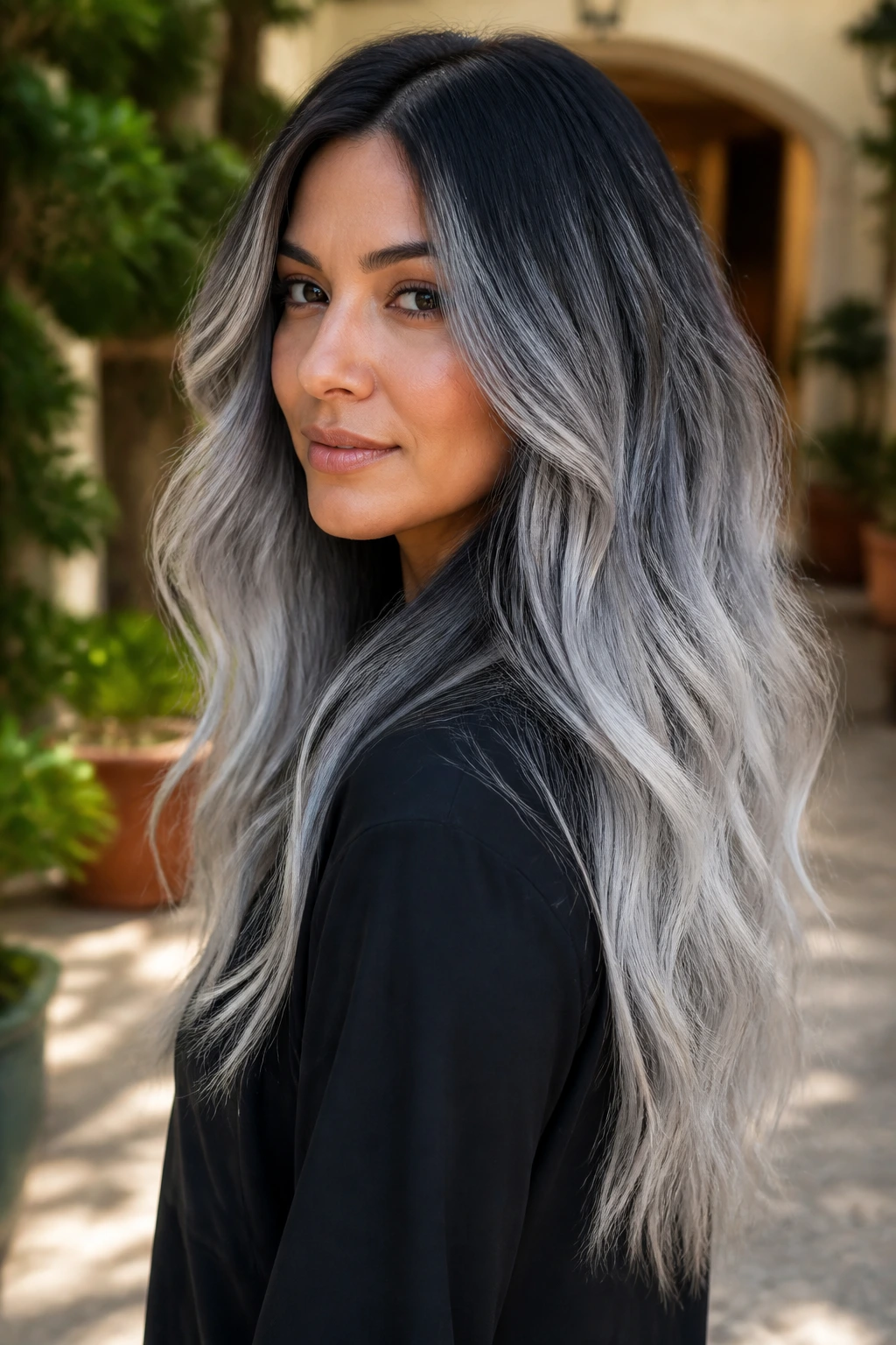 Portrait of a woman with metallic silver ombre hair and beachy waves