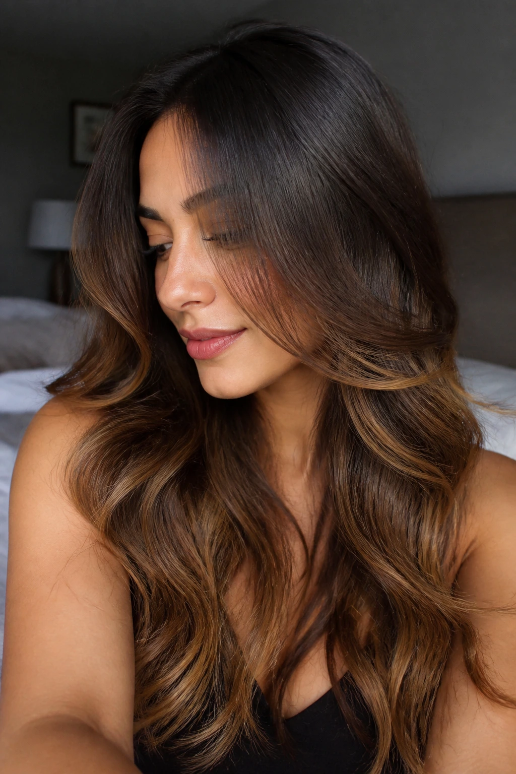 Close-up of mocha base with toffee swirl ends on a real person in soft morning light