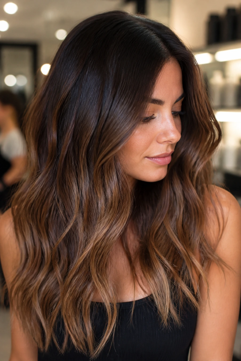 Close-up of dark hair with mocha ombre and soft root smudge