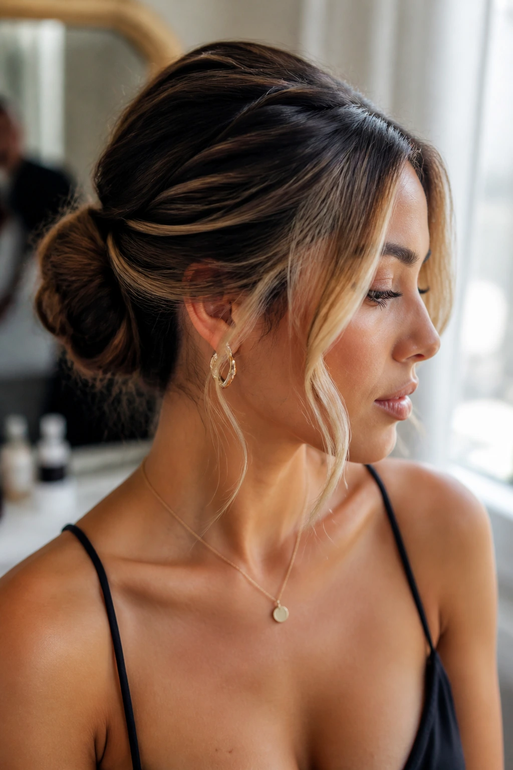 Close-up of money-piece highlights changing the shape of an updo