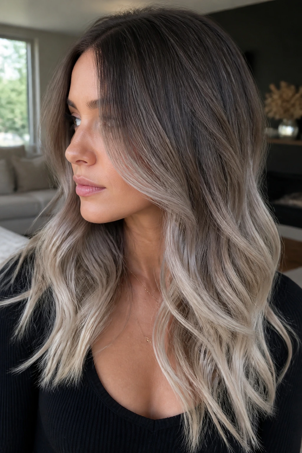 Real woman with mushroom brown to pearl-platinum drift hair