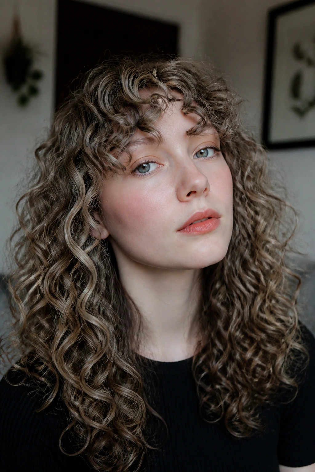 Curly hair with mushroom brown lowlights adding depth