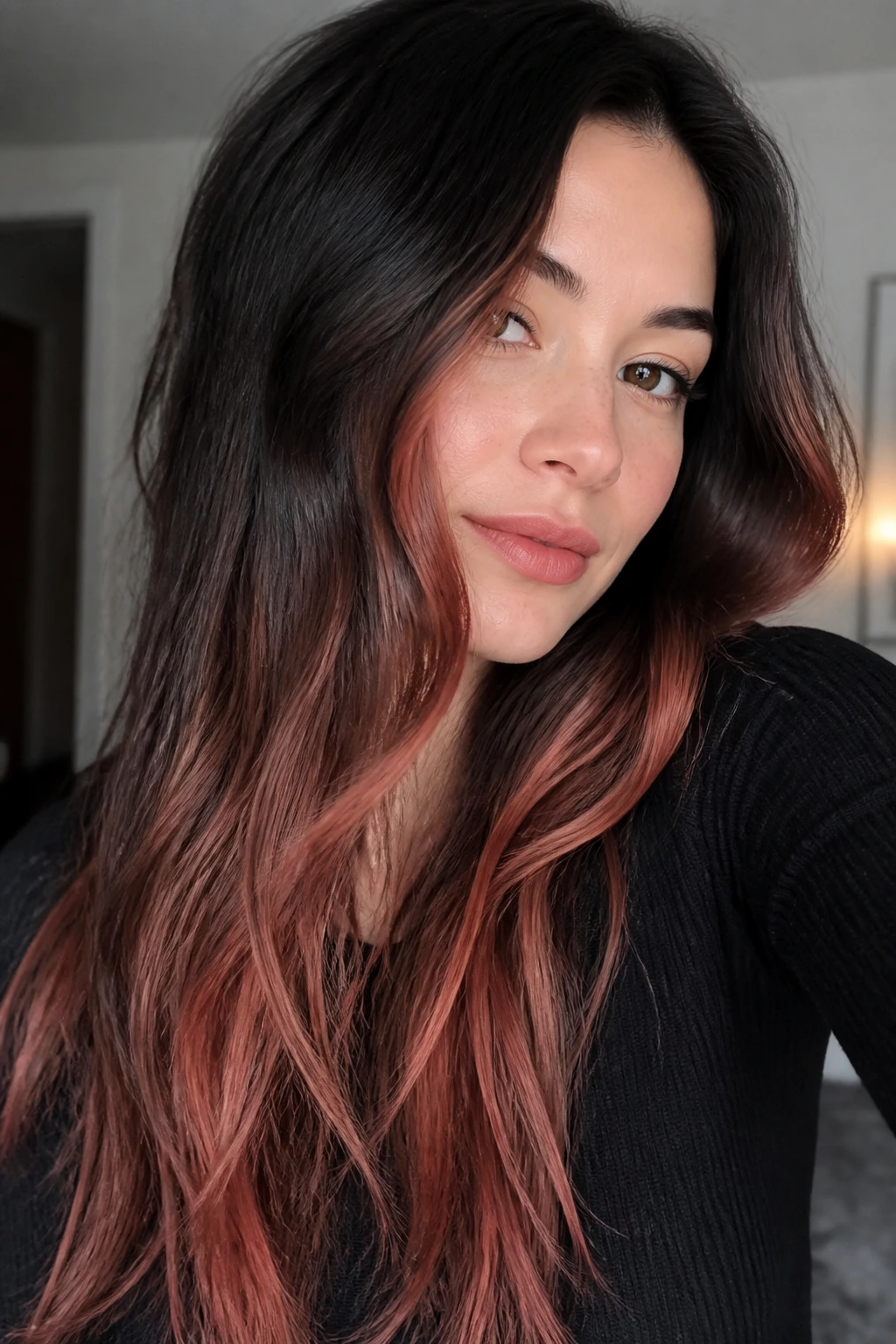 Long dark hair with muted coral glow along the lower lengths near the face.