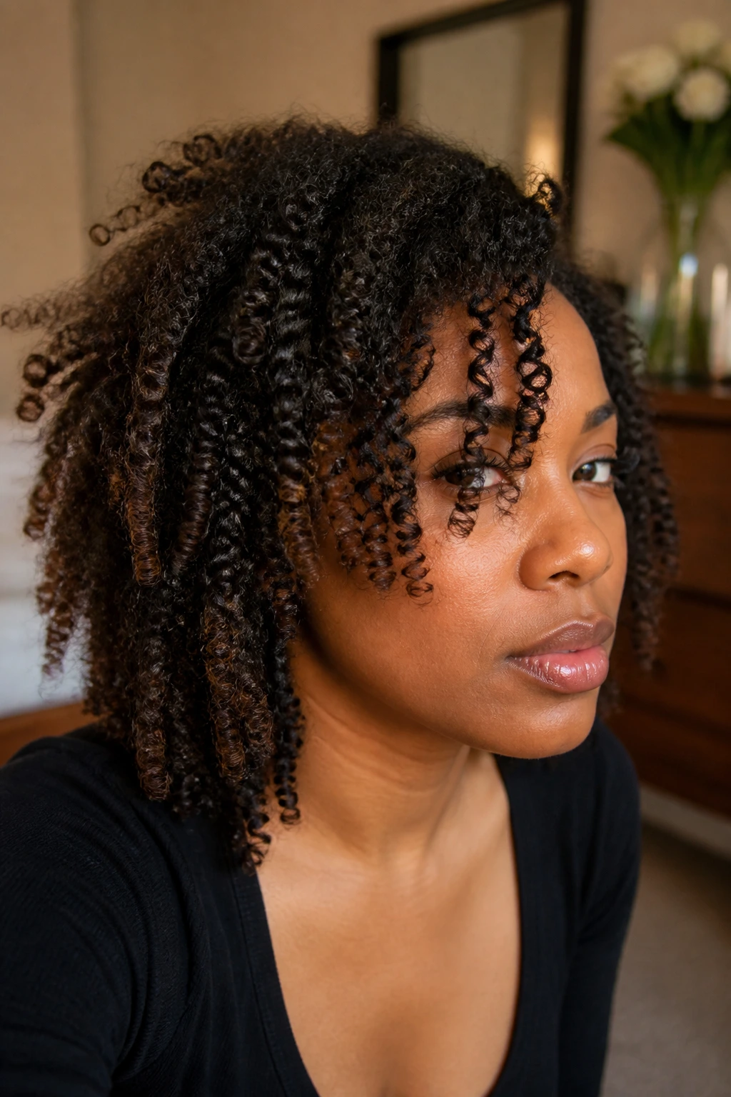 Close-up of natural textured hair showing varied curl patterns