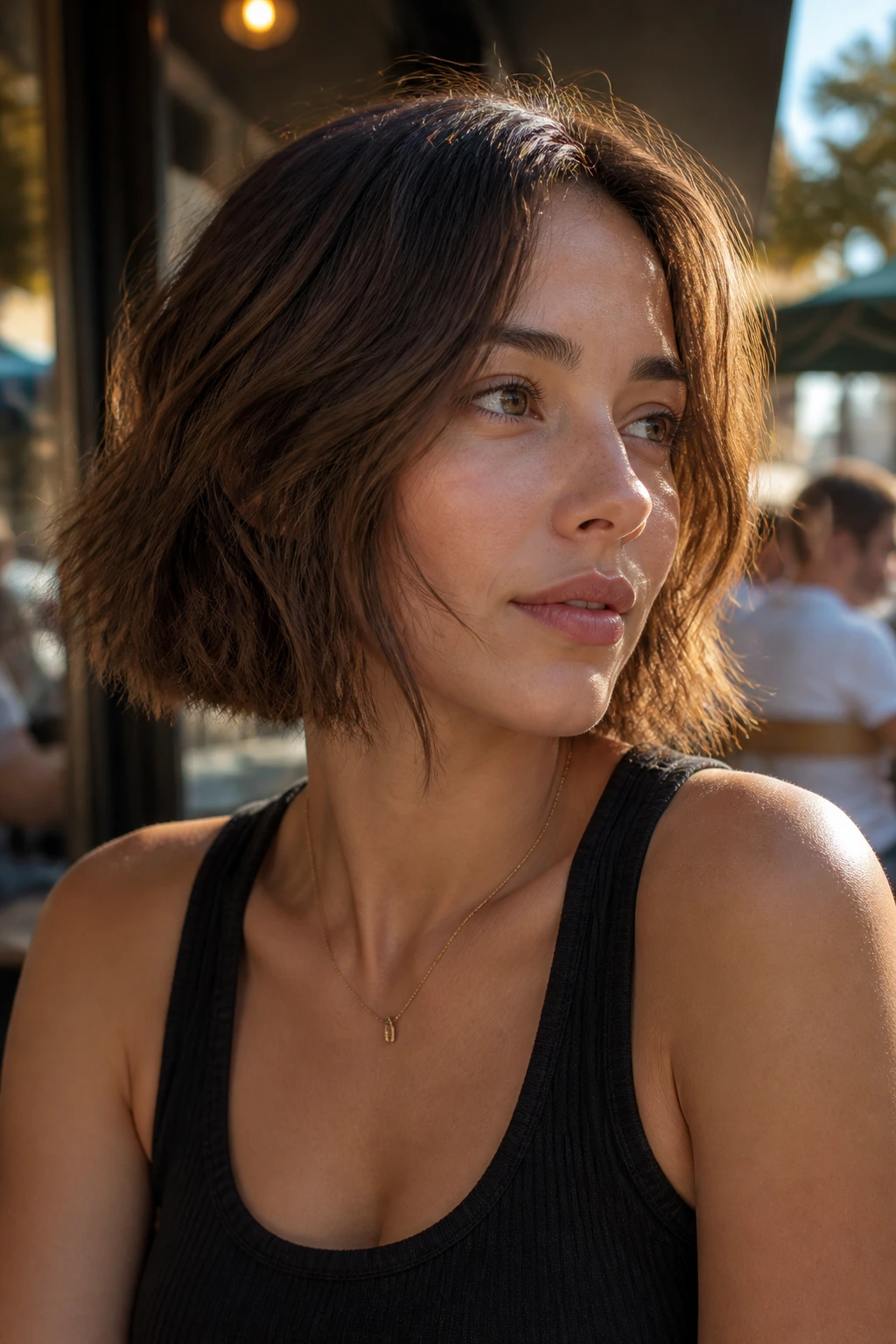 Real woman with neck-length lob and choppy ends showing movement