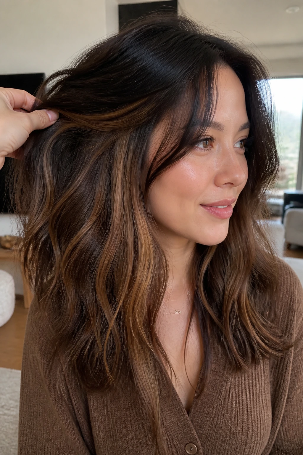 Close-up of a real woman with peekaboo caramel panels beneath the top layer