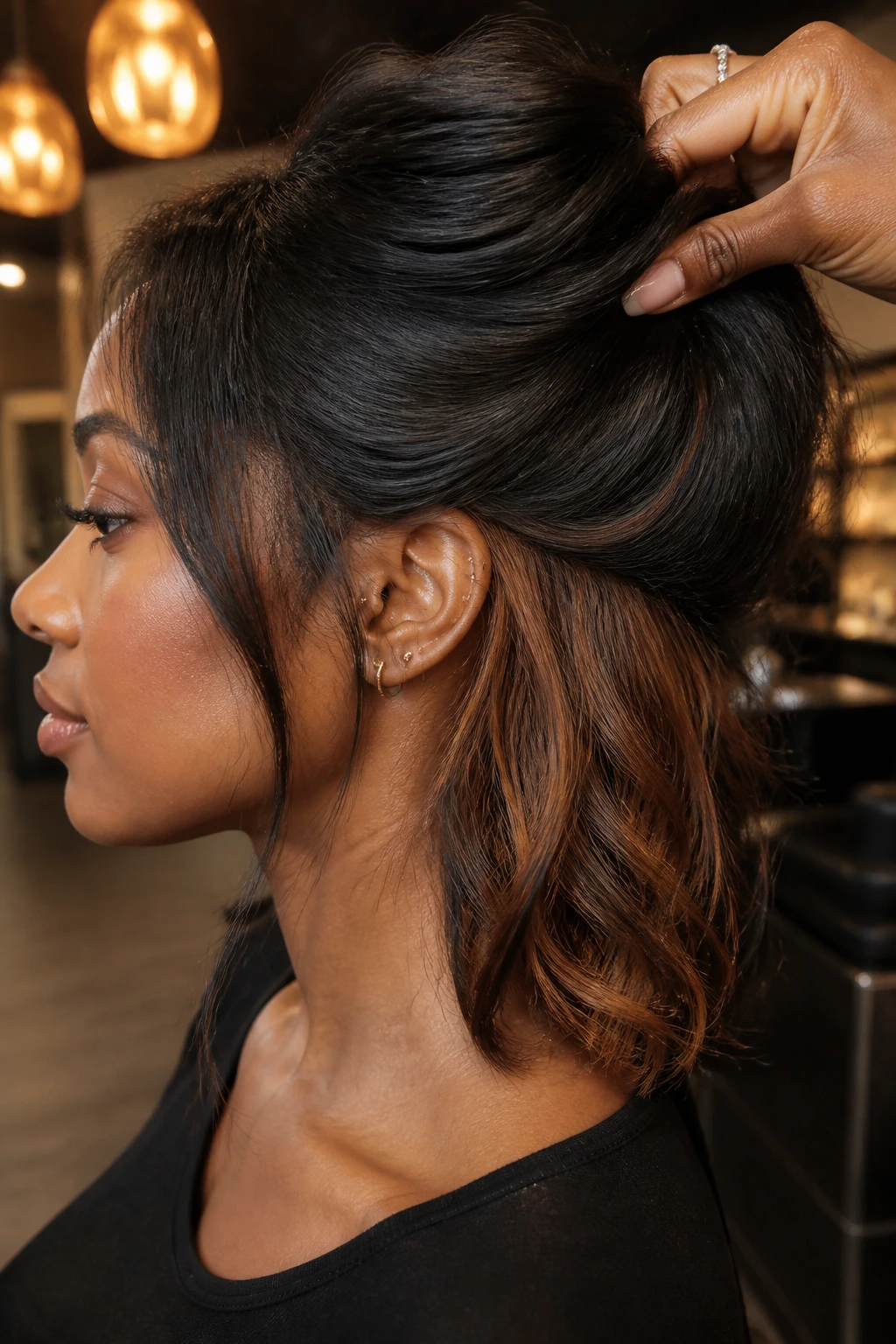 Peekaboo caramel panels under dark hair