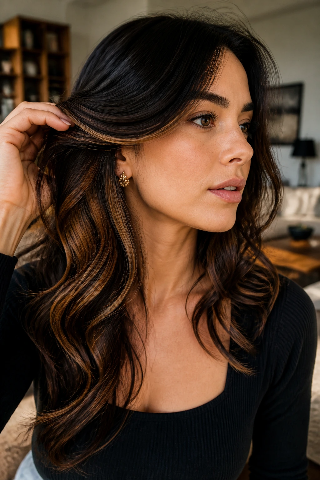 Portrait showing caramel underlayers peeking beneath a dark top layer
