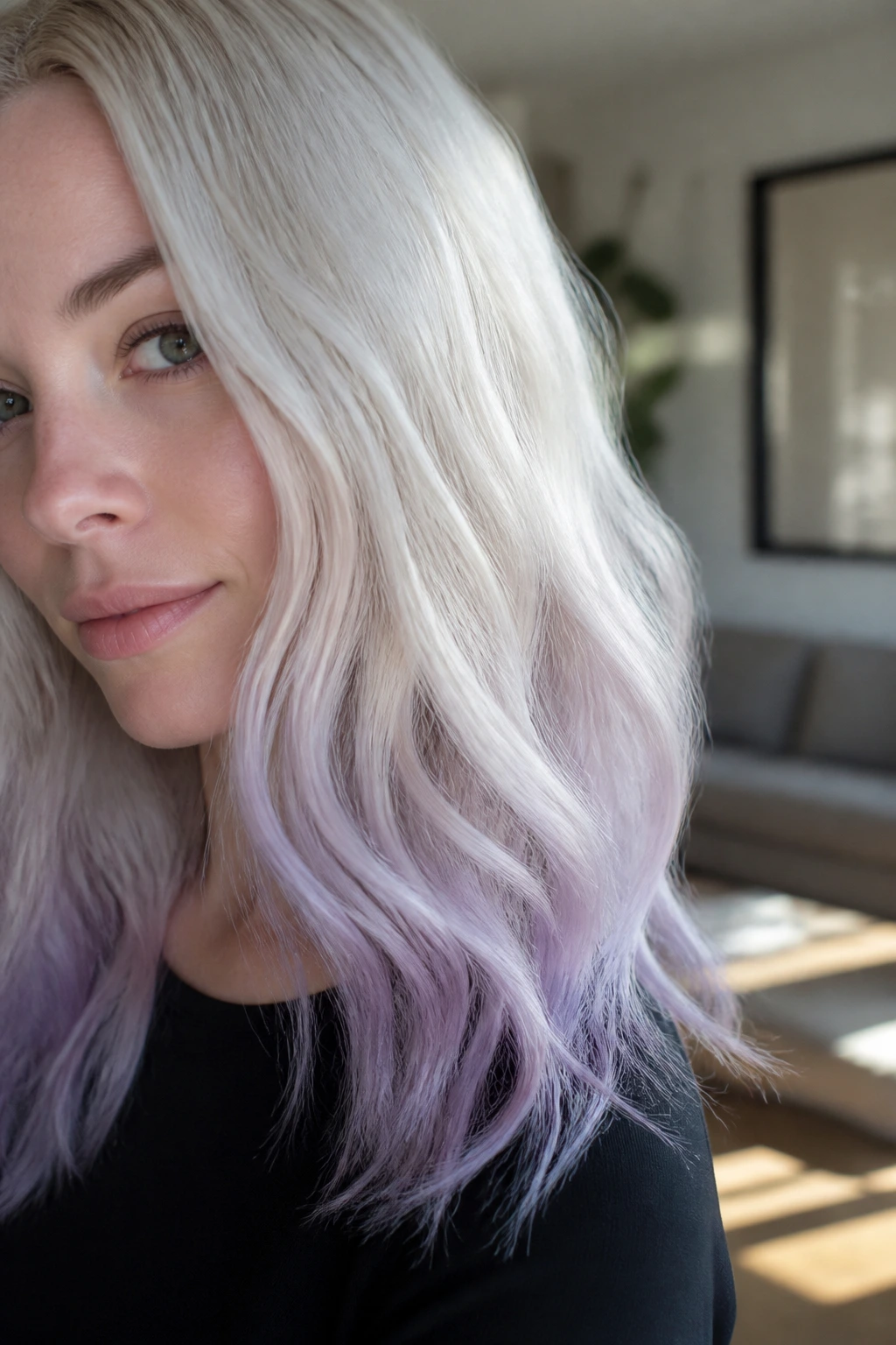 Platinum hair with lavender ends on a real woman in a sunny living room
