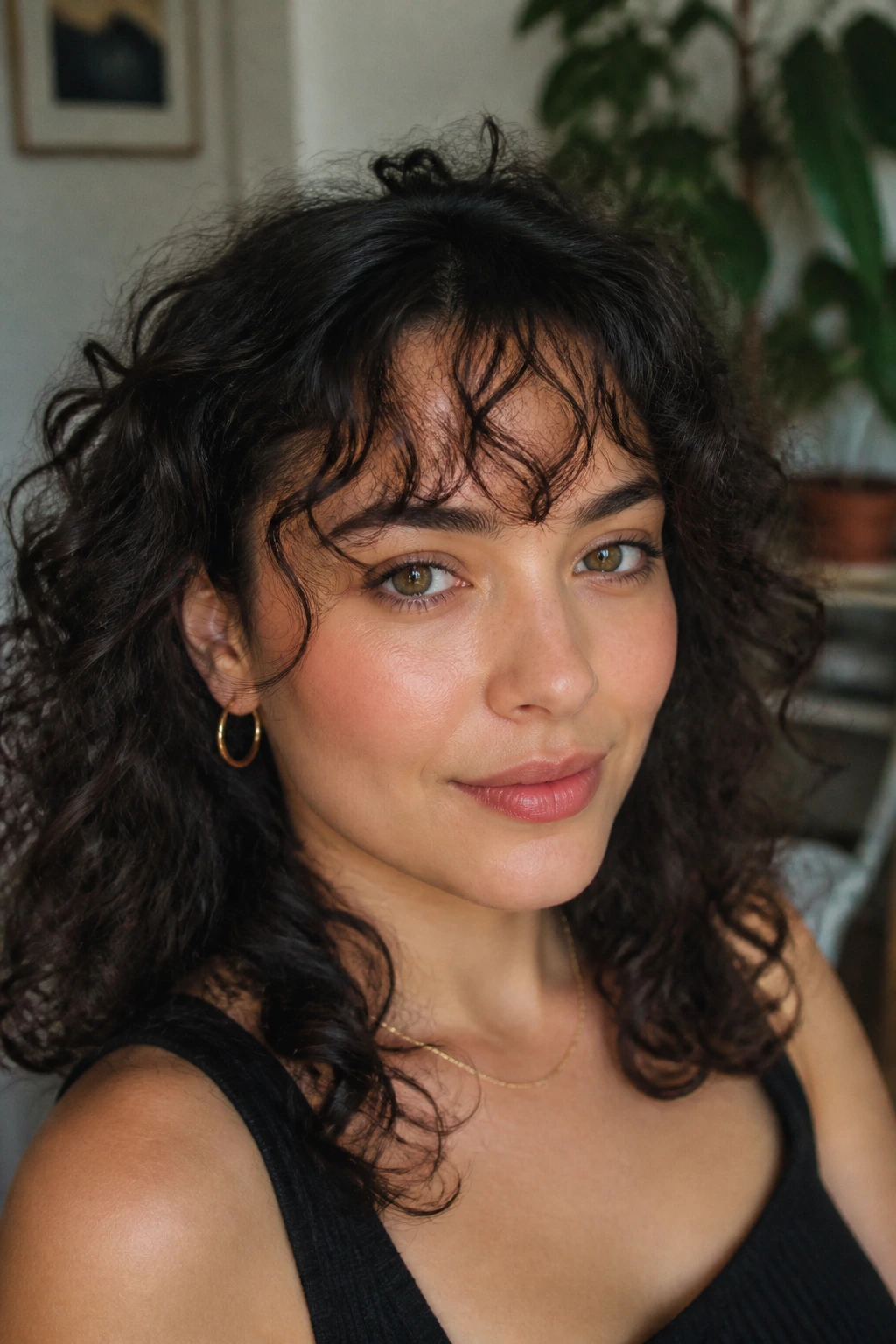 Real woman with feathered point-cut fringe and wispy ends