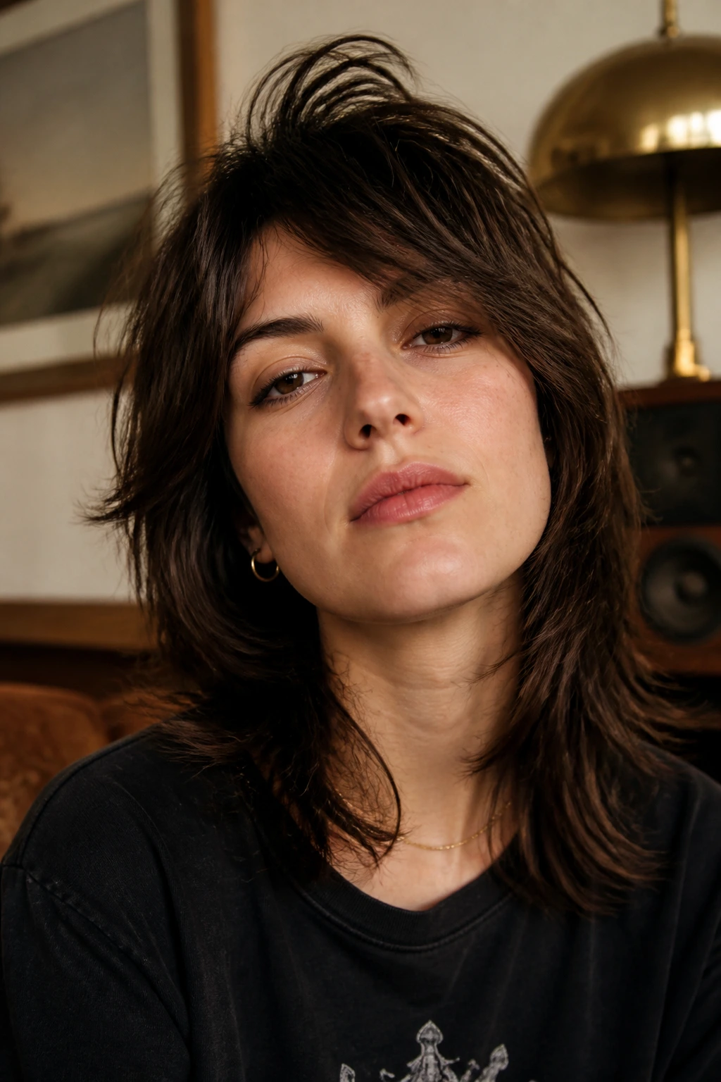 Portrait of a real person with retro rocker cut and feathery ends